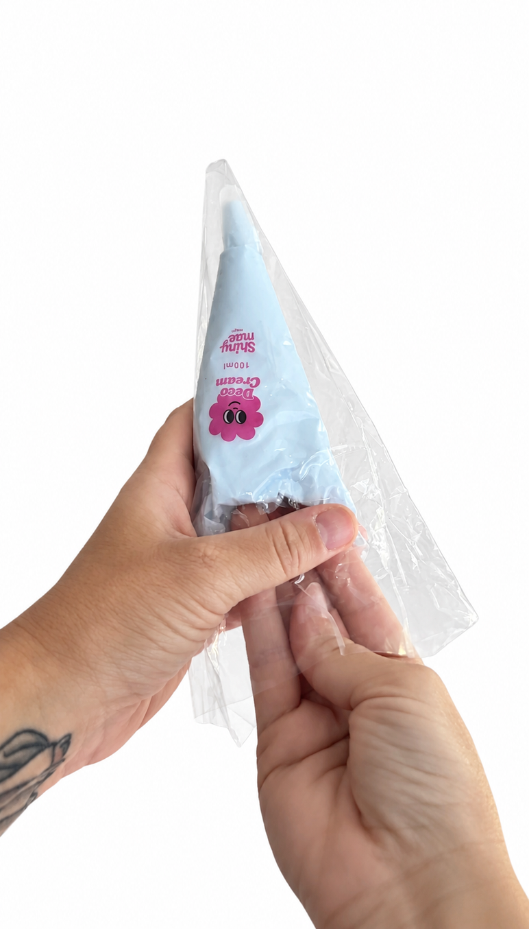 Insert the Deco Cream bag into the outer bag.